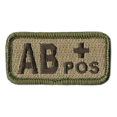 A B+ velcro patch is affixed to a soldiers body armour on his chest to  signify his blood type should he need first aid in the battlefield. This  soldier and many others